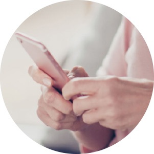 A Lady Scrolling On Her Phone